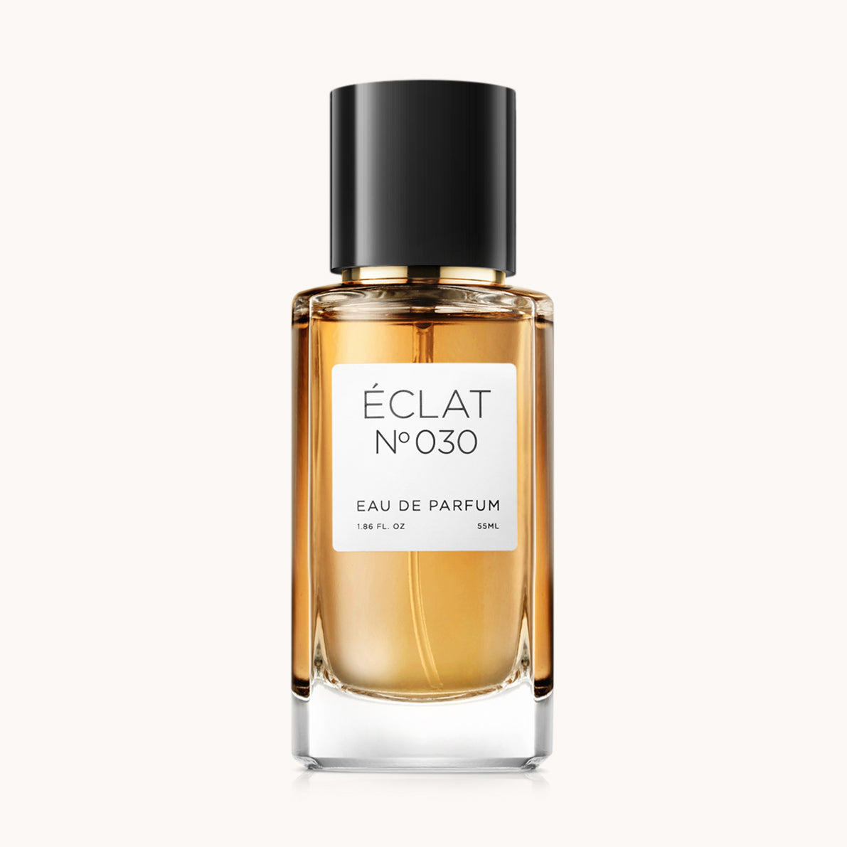 Flacon of the women's perfume dupe ÉCLAT No. 030, an elegant transparent glass bottle with a black cylindrical magnetic cap and a white label. The label features the brand name ÉCLAT, the number 030, and the words “Eau de Parfum”.