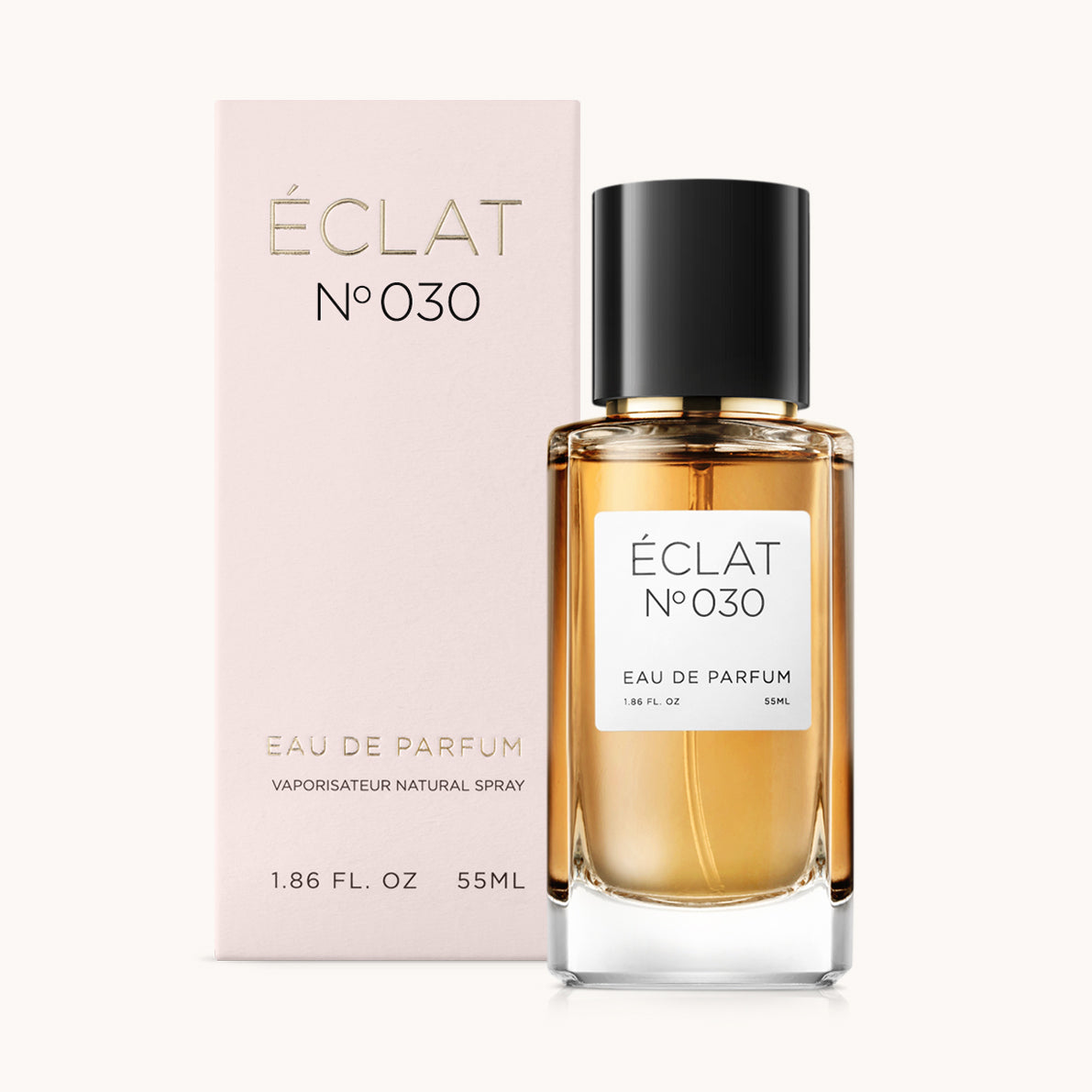ÉCLAT No. 030 perfume bottle with matching light pink packaging. The elegant glass flacon features a black cylindrical magnetic cap and a simple white label with the inscription ÉCLAT No. 030 and “Eau de Parfum”.