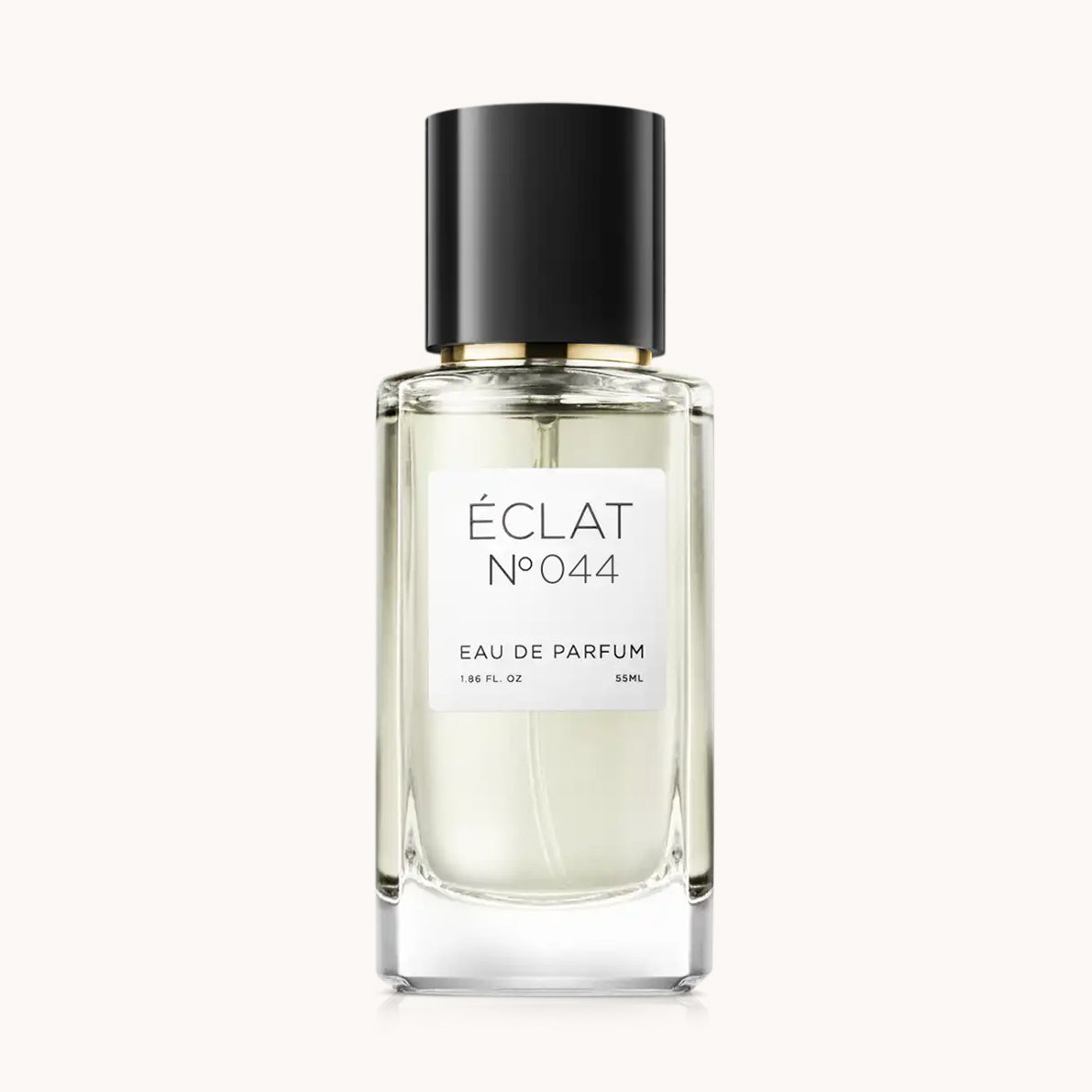 Flacon of the women's perfume dupe ÉCLAT No. 044 VIP, an elegant transparent glass bottle with a black cylindrical magnetic cap and a white label. The label features the brand name ÉCLAT, the number 044 VIP, and the words “Eau de Parfum”.