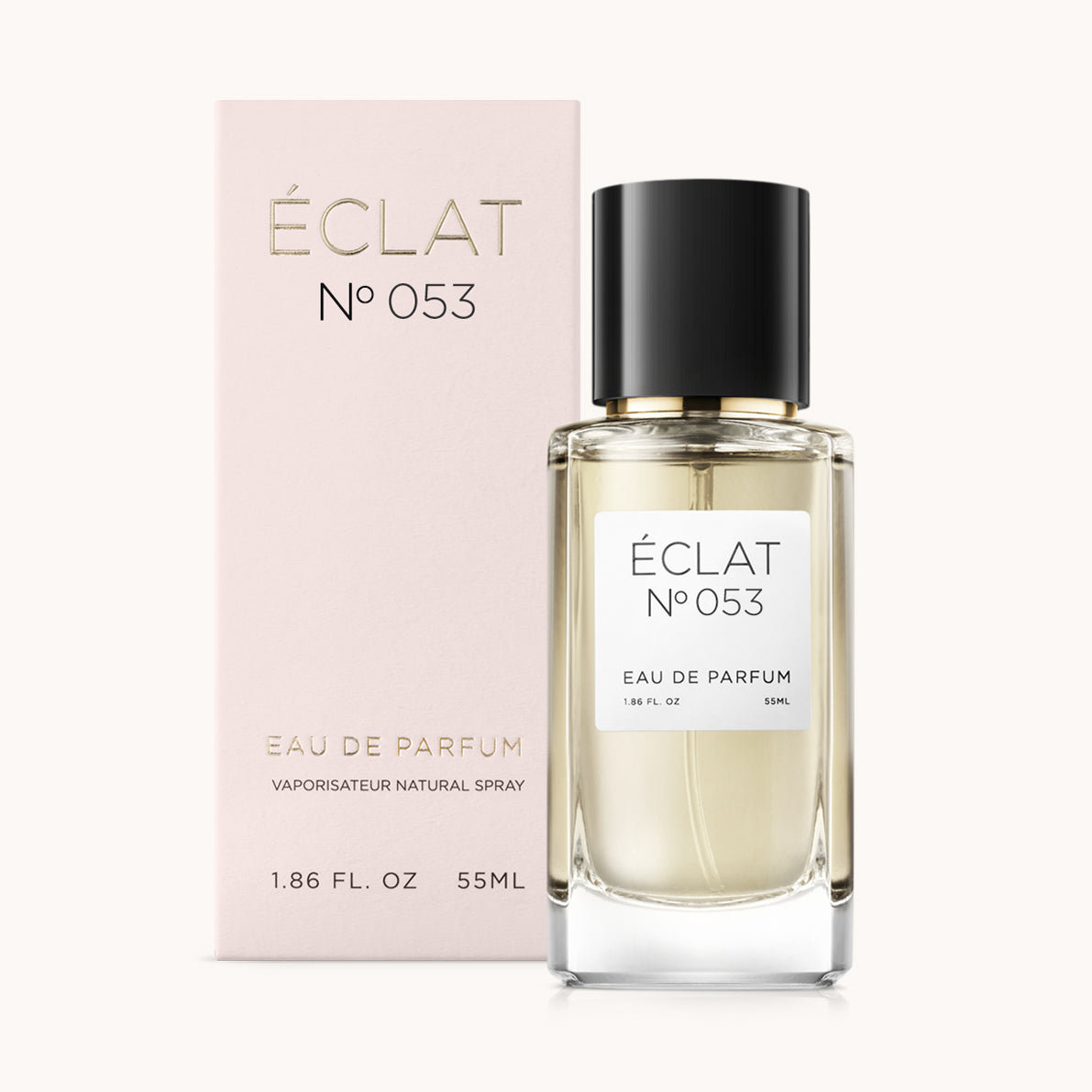 ÉCLAT No. 053 perfume bottle with matching light pink packaging. The elegant glass flacon features a black cylindrical magnetic cap and a simple white label with the inscription ÉCLAT No. 053 and “Eau de Parfum”.