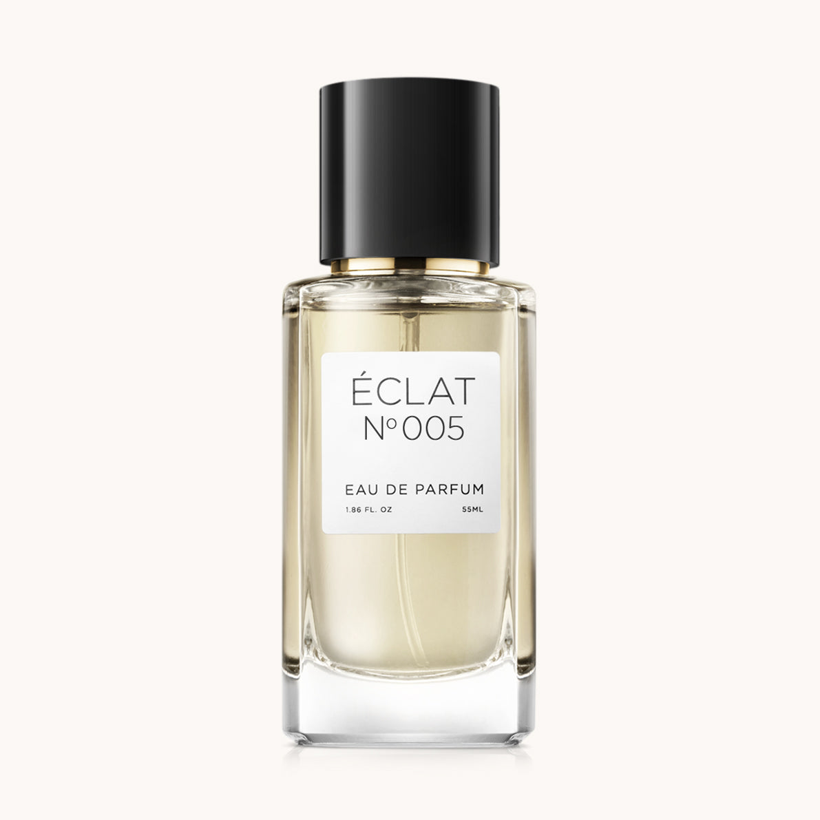 Fasetowany flakon szklany z czarną nakrętką i białą etykietą dla zapachu ÉCLAT Coconut & Jasmine.