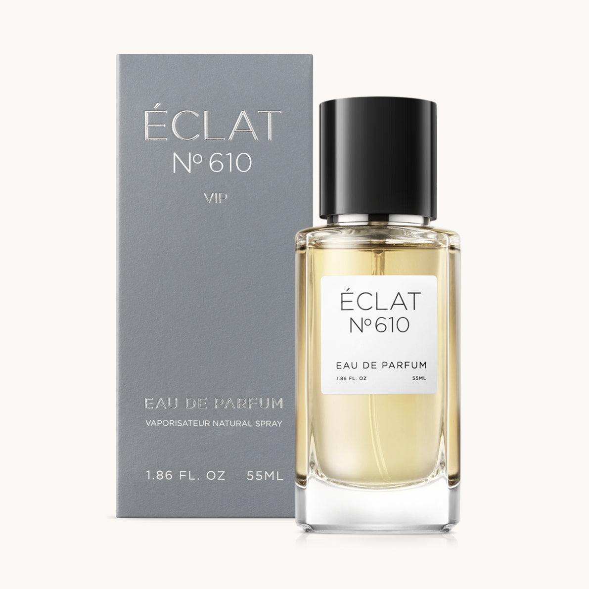 ÉCLAT No. 610 VIP men’s perfume bottle with matching bluish-grey packaging. The elegant flacon features a black cylindrical magnetic cap and a clean white label with the inscription ÉCLAT No. 610 VIP and “Eau de Parfum”.