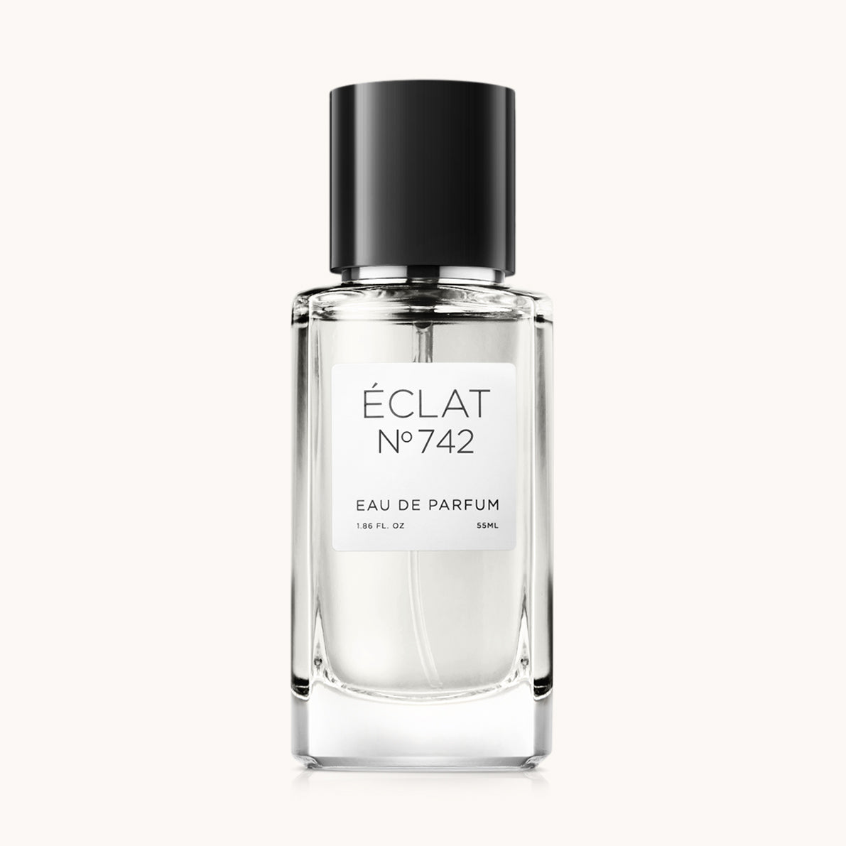 ÉCLAT No. 742 VIP men’s perfume bottle with matching bluish-grey packaging. The elegant flacon features a black cylindrical magnetic cap and a clean white label with the inscription ÉCLAT No. 742 VIP and “Eau de Parfum”.