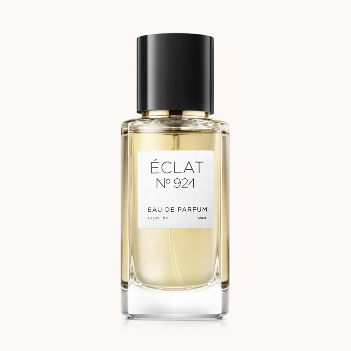 Flacon of the unisex fragrance dupe ÉCLAT No. 924, an elegant transparent glass bottle with a black cylindrical magnetic cap and a minimalist white label. The label displays the brand name ÉCLAT, the number 924, and the phrase “Eau de Parfum”.