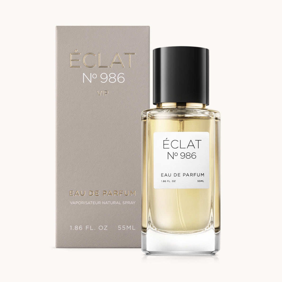 Flacon of the unisex perfume dupe ÉCLAT No. 986 VIP, an elegant transparent glass bottle with a black cylindrical magnetic cap and a minimalist white label. The label displays the brand name ÉCLAT, the number 986 VIP, and the phrase “Eau de Parfum”.