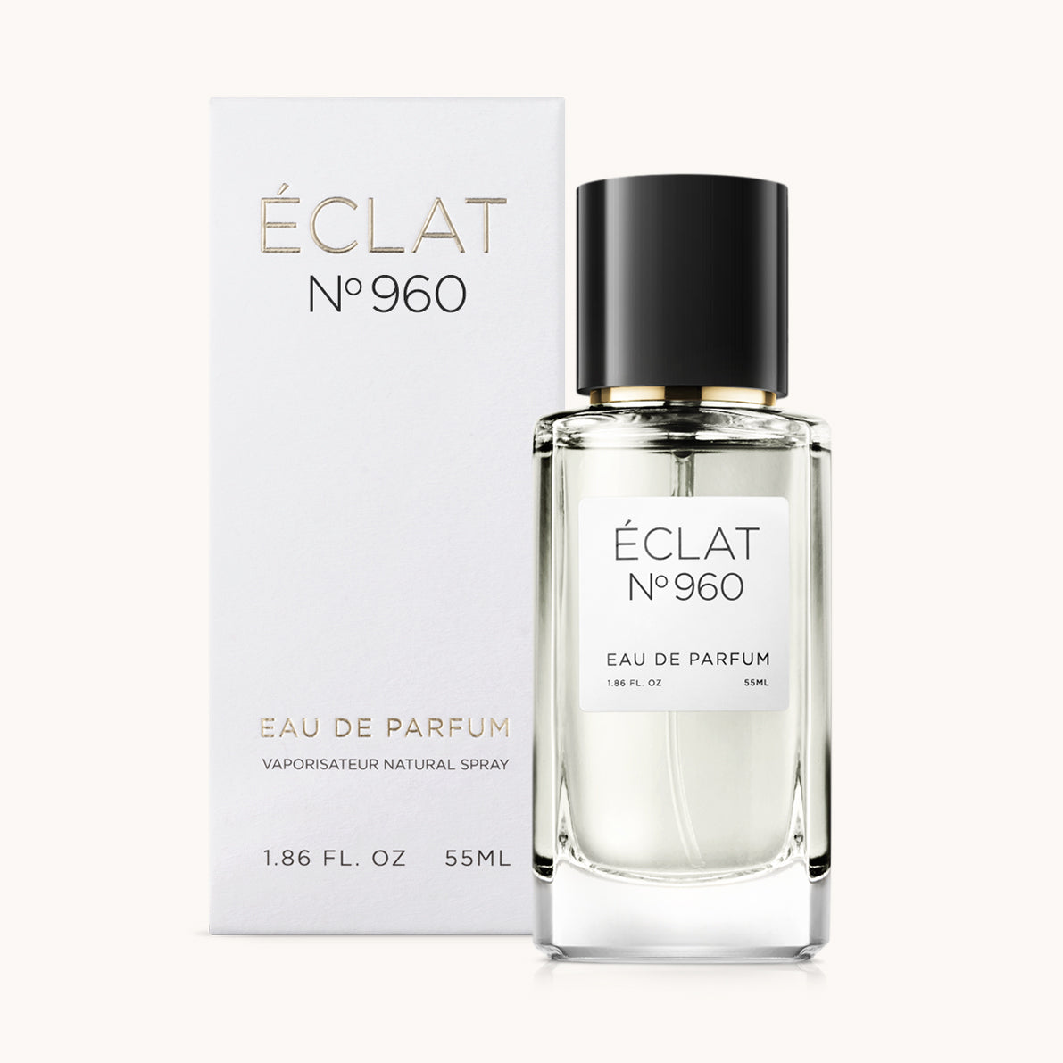 Flakon perfum ÉCLAT Fresh Ginger z czarną nakrętką i białą etykietą, w towarzystwie eleganckiego białego opakowania.