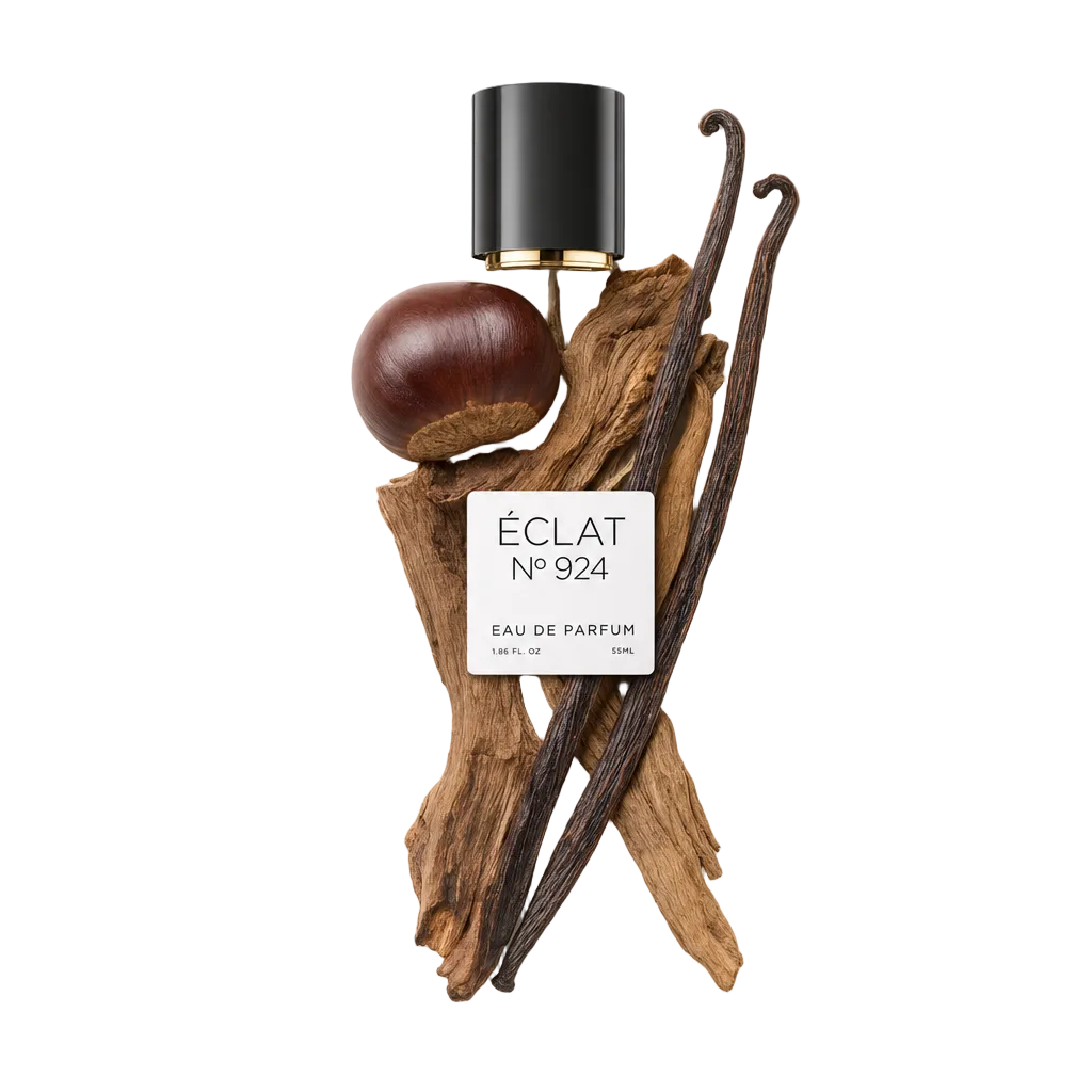 Artystyczna kompozycja ÉCLAT Smoky Chestnut obejmuje błyszczącą czarną nasadkę ze złotym akcentem, całe kasztany, pachnące laski wanilii i fakturowane elementy z drewna.
