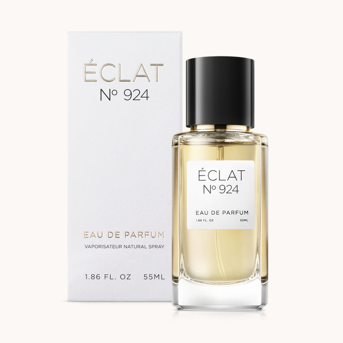 Elegancki flakon szklany z czarną nakrętką i białą etykietą, obok dopasowanego pudełka z nazwą ÉCLAT Smoky Chestnut.