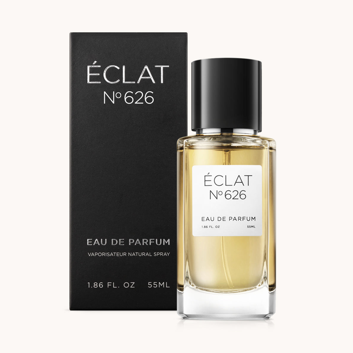 Flakon perfum ÉCLAT Spicy Blackcurrant z eleganckim czarnym korkiem i czarnym pudełkiem.