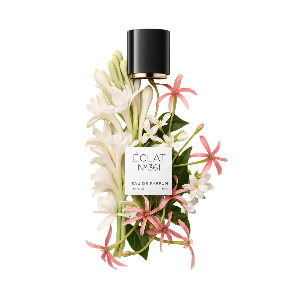Kompozycja z białych tuberozy i różowego jaśminu otacza czarną nasadkę z etykietą ÉCLAT Tuberose & Jasmine.