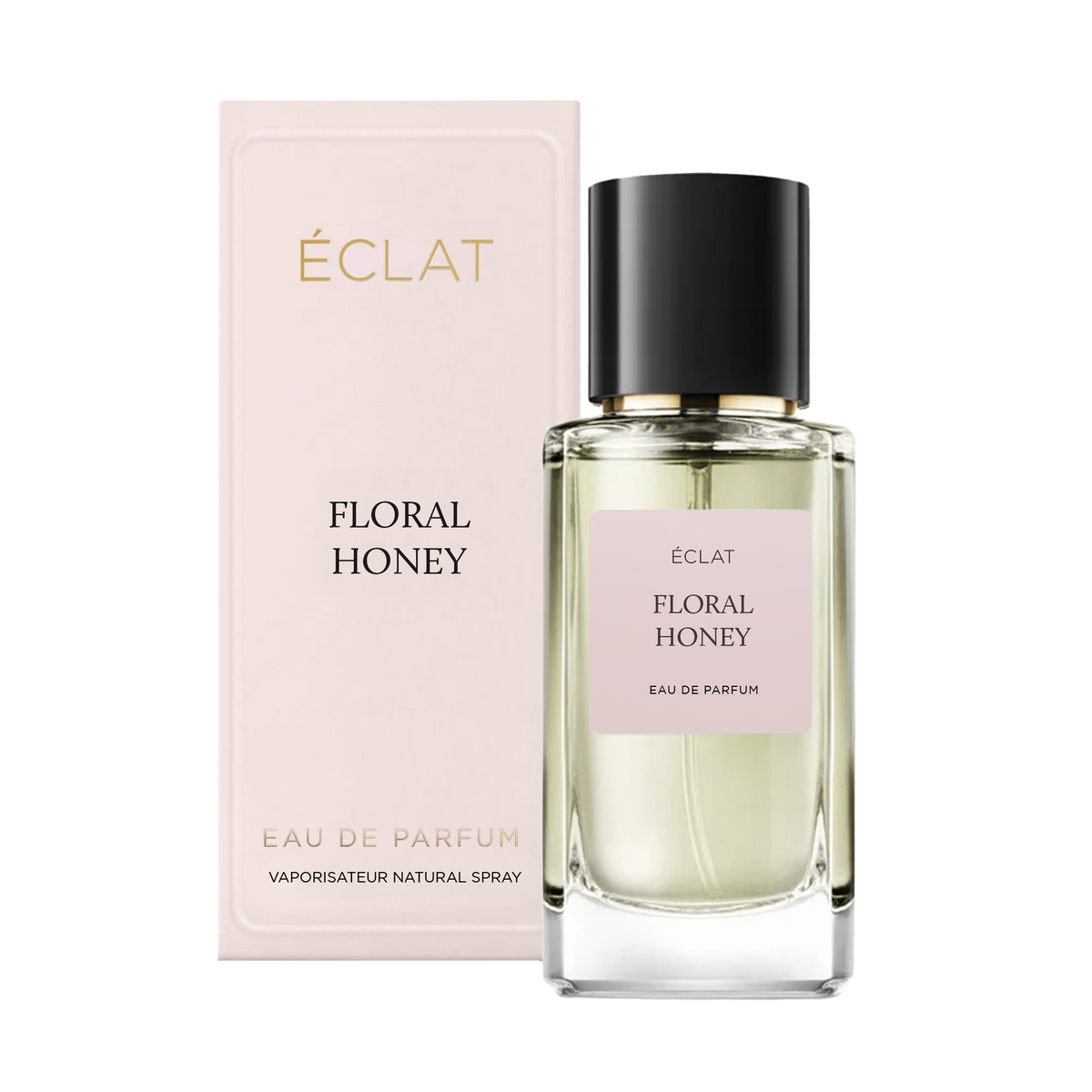 ÉCLAT FLORAL HONEY Eau de Parfum w przezroczystej szklanej butelce z czarną nakrętką, obok jasnoróżowego pudełka.