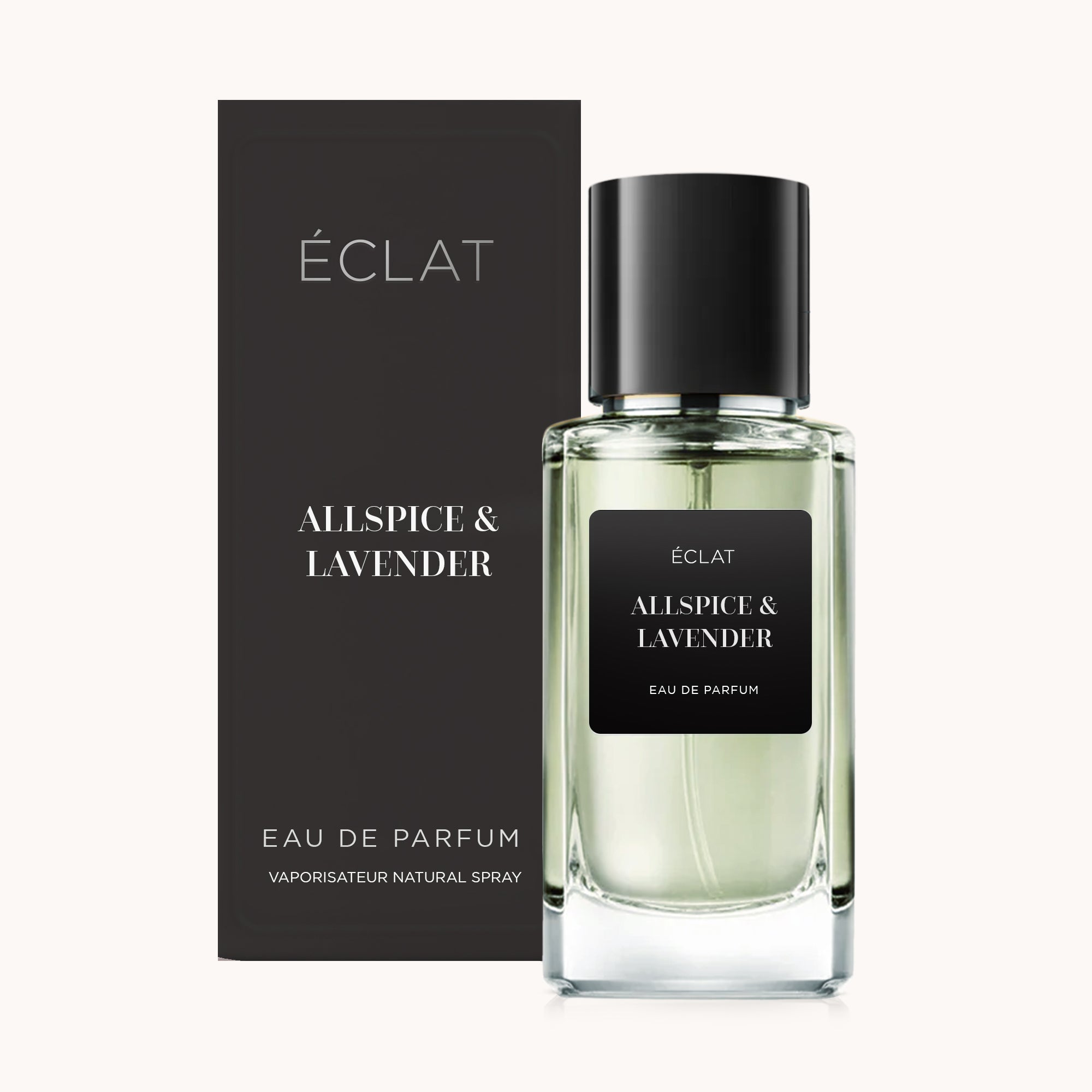 Fasetowana szklana butelka ÉCLAT Allspice & Lavender z czarną zakrętką, obok eleganckiego czarnego pudełka.
