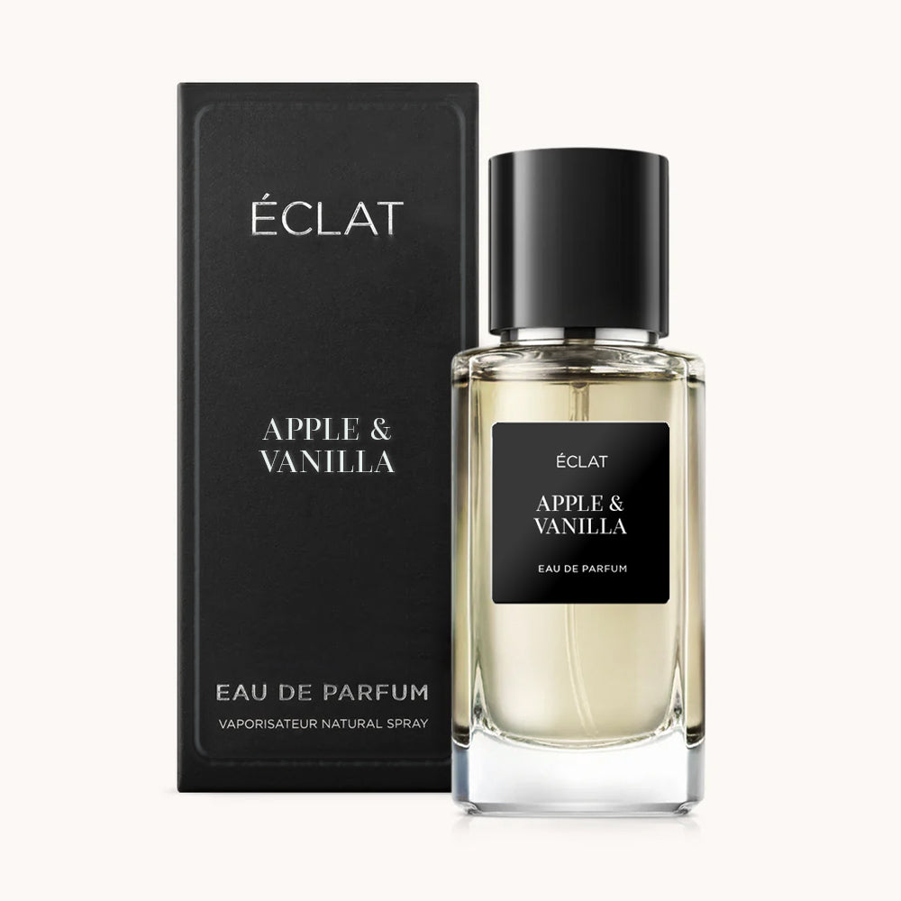 ÉCLAT Apple & Vanilla to elegancki flakon szklany z czarną etykietą, w towarzystwie pasującego eleganckiego pudełka.