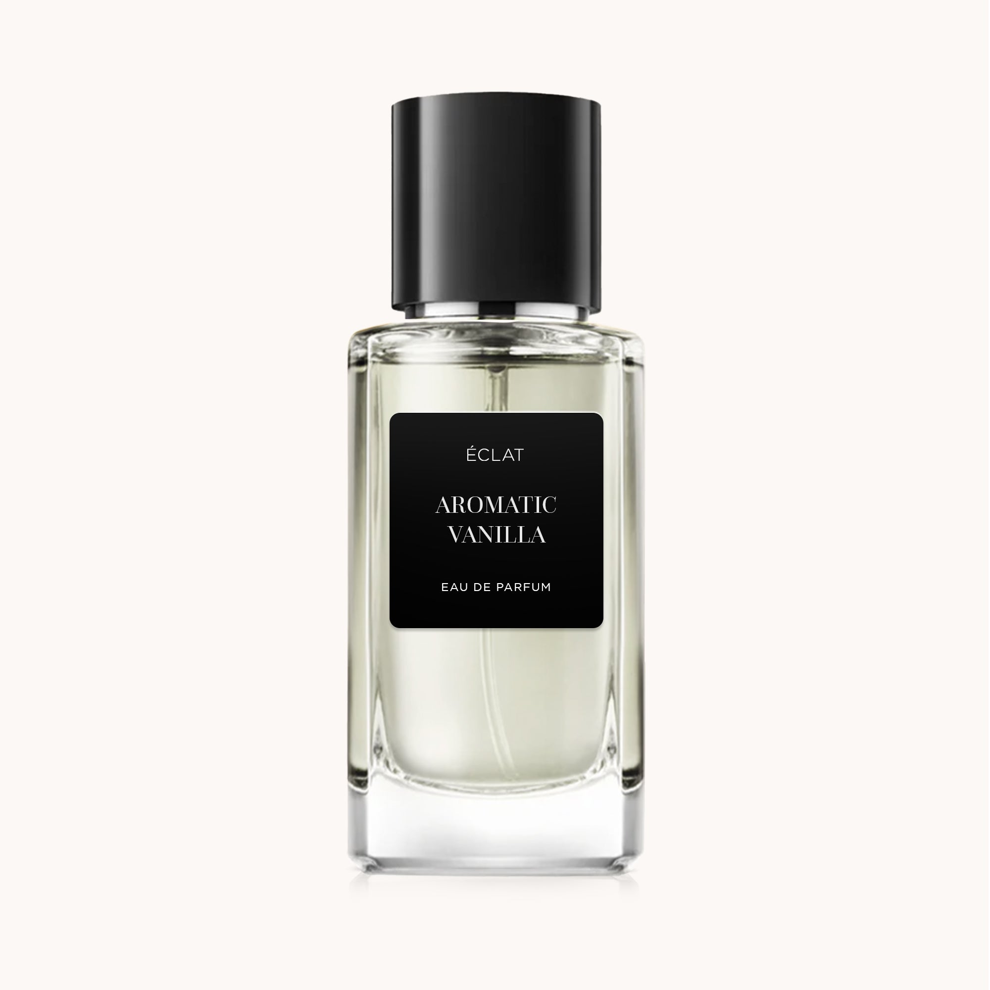 Przezroczysta szklana butelka ÉCLAT Aromatic Vanilla z czarną etykietą i dopasowaną nakrętką.