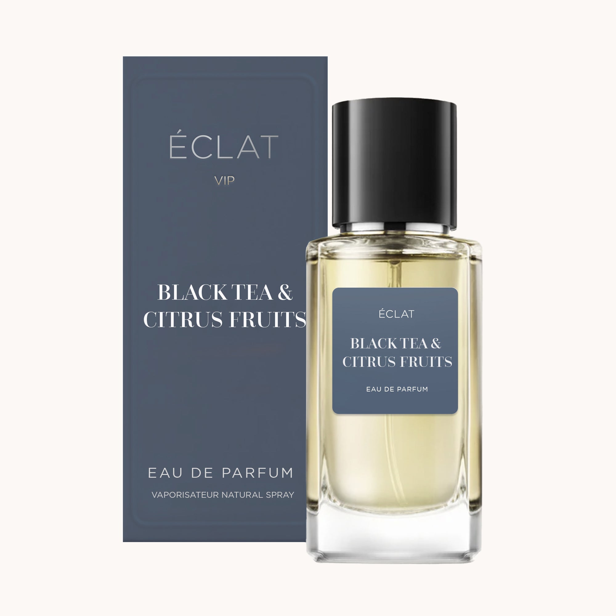 Flakon perfum ÉCLAT VIP Black Tea & Citrus Fruits z ciemnoniebieską etykietą i pasującym pudełkiem.