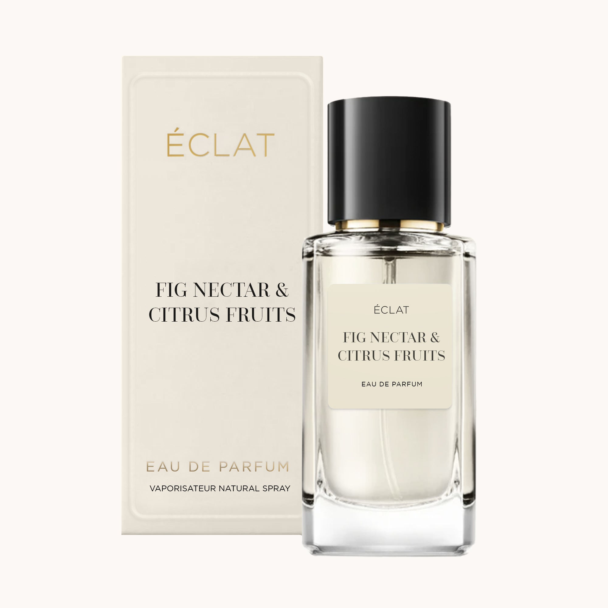 Perfumy ÉCLAT Fig Nectar & Citrus Fruits w przezroczystej szklanej butelce z czarną nakrętką, obok eleganckiego kremowego pudełka.