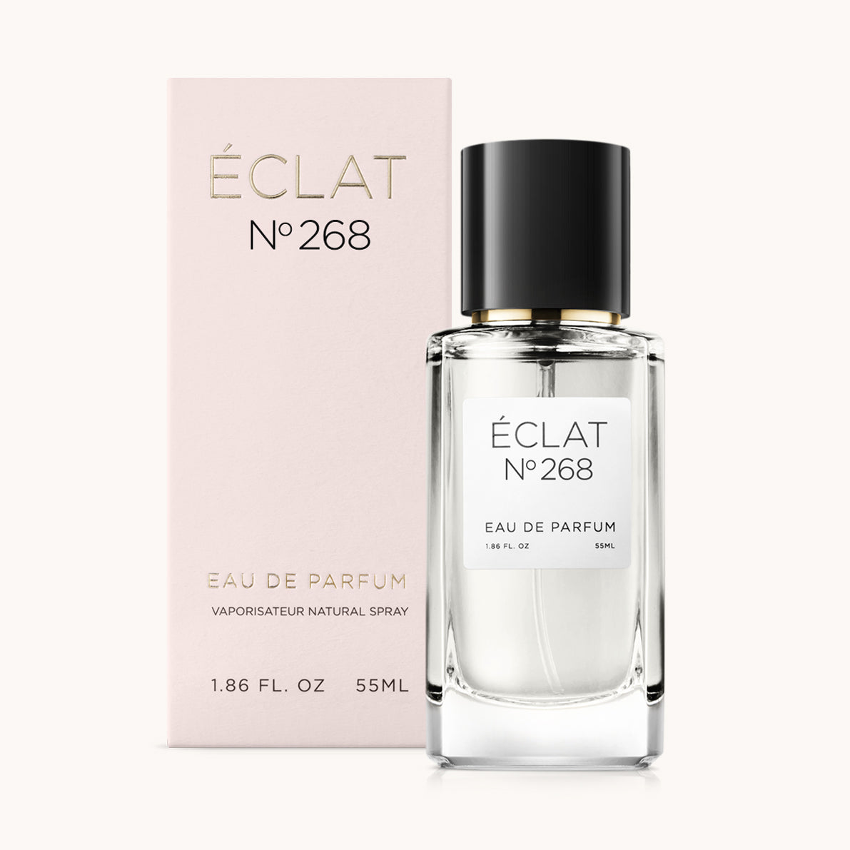 ÉCLAT Floral Peony, przezroczysty szklany flakon z czarną nakrętką, obok miękkiego różowego pudełka.