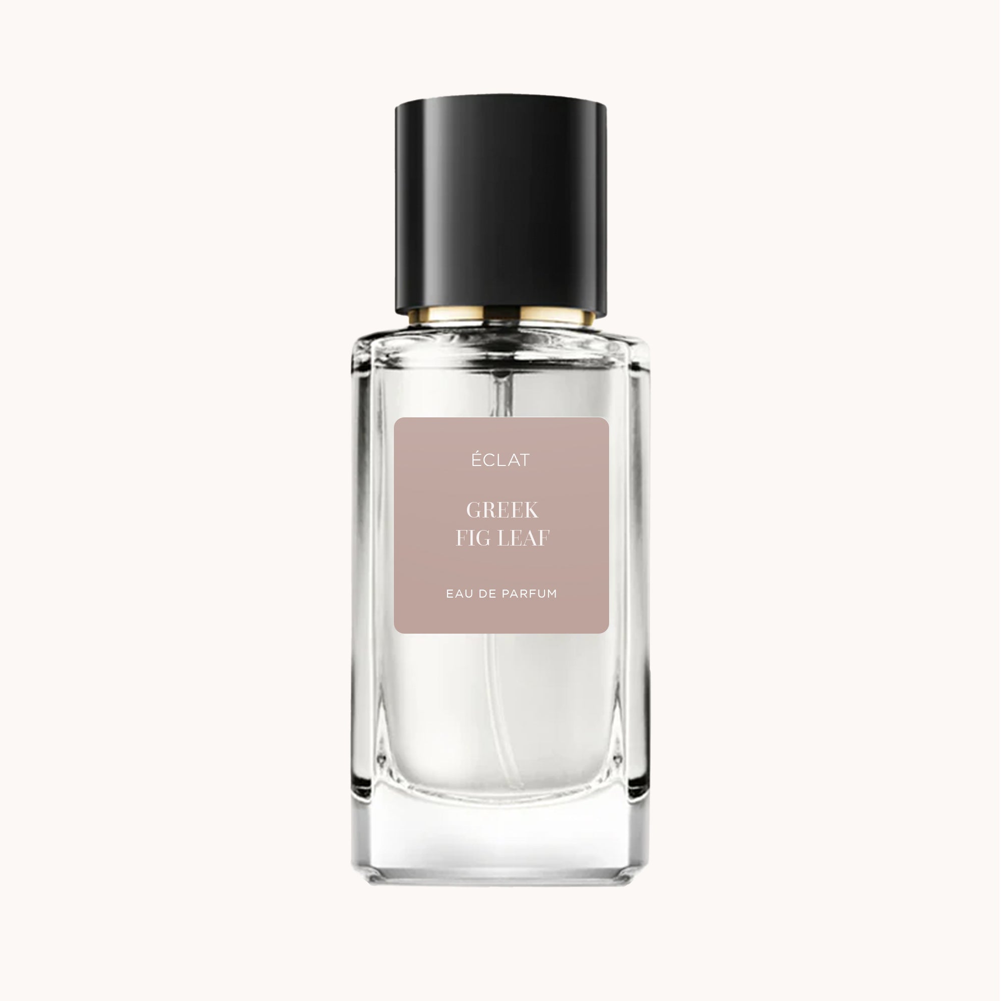 Fasetowana szklana butelka ÉCLAT Greek Fig Leaf z matową etykietą i elegancką czarną nakrętką.