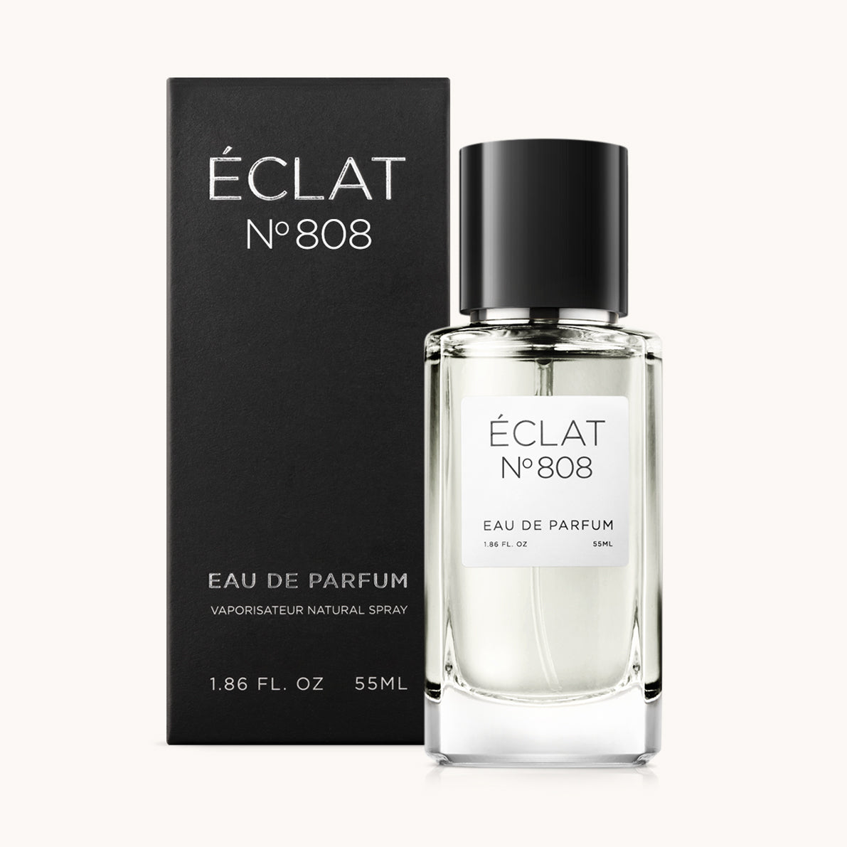 Perfumy ÉCLAT 808 w przezroczystym szklanym flakonie z czarną nakrętką, w towarzystwie czarnego pudełka.