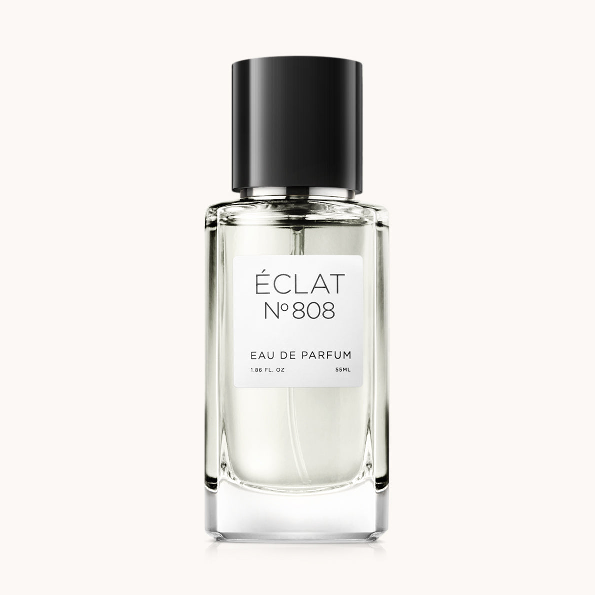 ÉCLAT Juniper Berry & Blood Orange w fasetowanej szklanej butelce z elegancką czarną nakrętką.