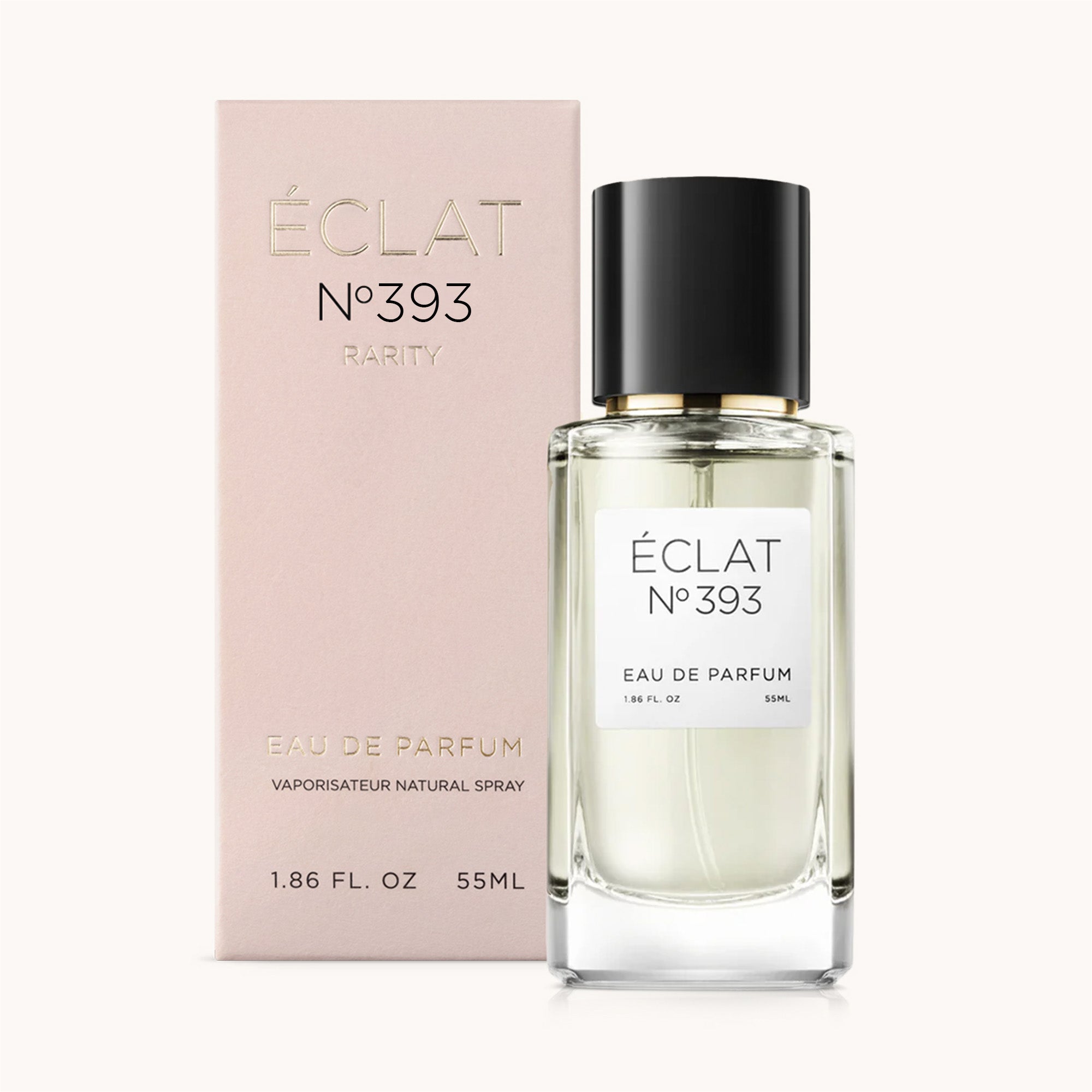 Elegancka butelka perfum ÉCLAT Musky Raspberry z czarnym korkiem, obok różowego pudełka ze złotymi detalami.