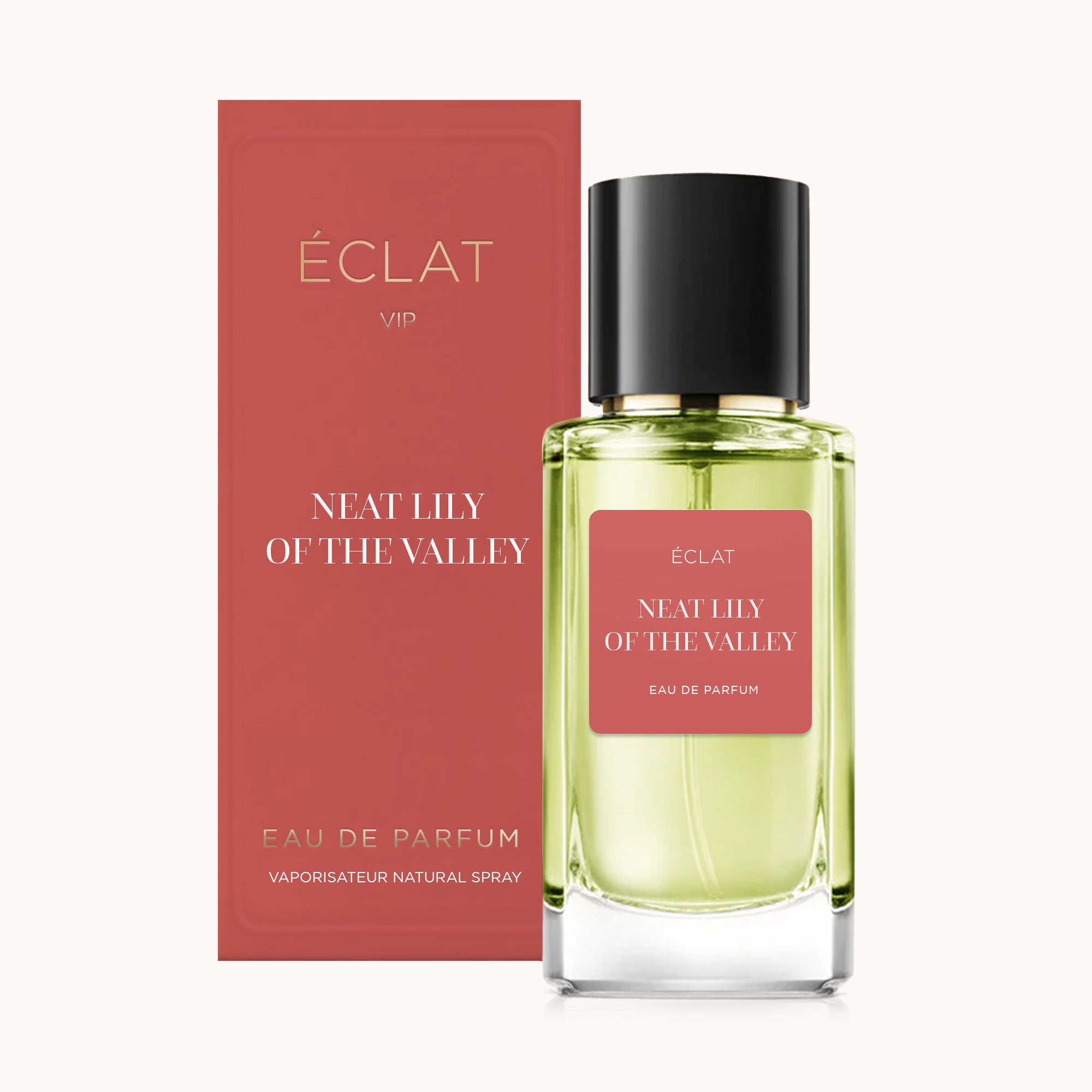 Flakon perfum ÉCLAT Neat Lily of the Valley VIP z przezroczystym szklanym flakonem i czarną nakrętką jest wyeksponowany obok eleganckiego czerwonego opakowania.