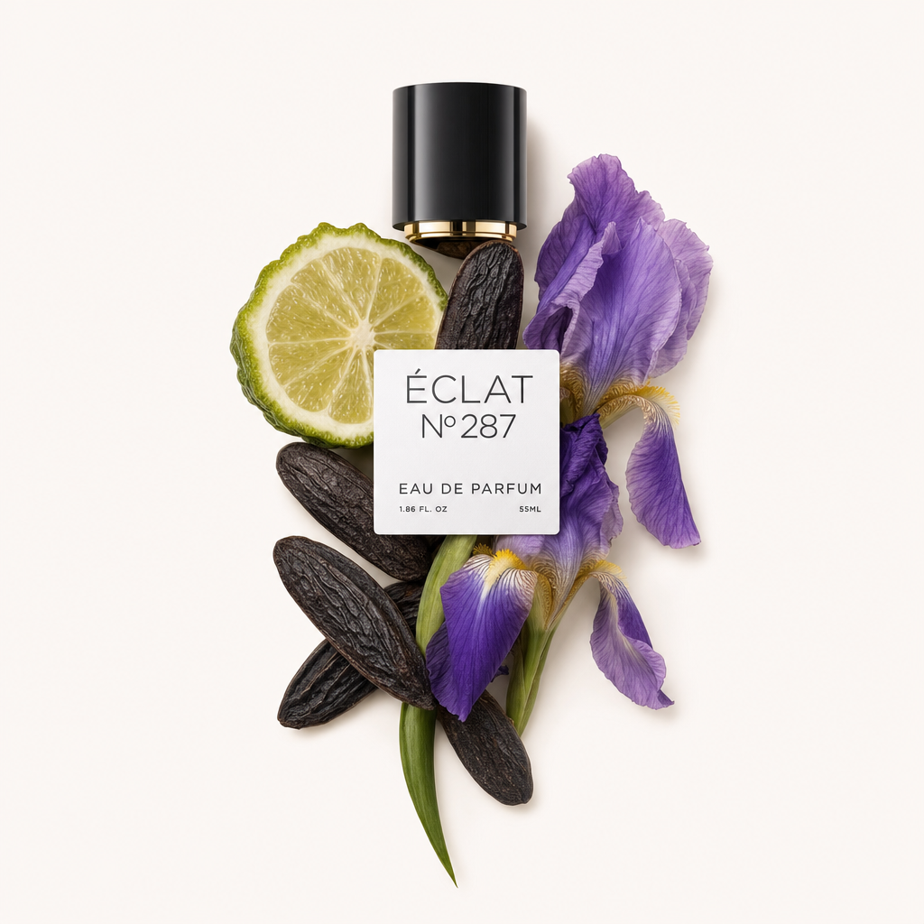 Kompozycja składników perfum dla ÉCLAT Oriental Iris z plasterkiem limonki, tonkowcem i kwiatami fioletowego irysa, z czarną nakrętką i etykietą.