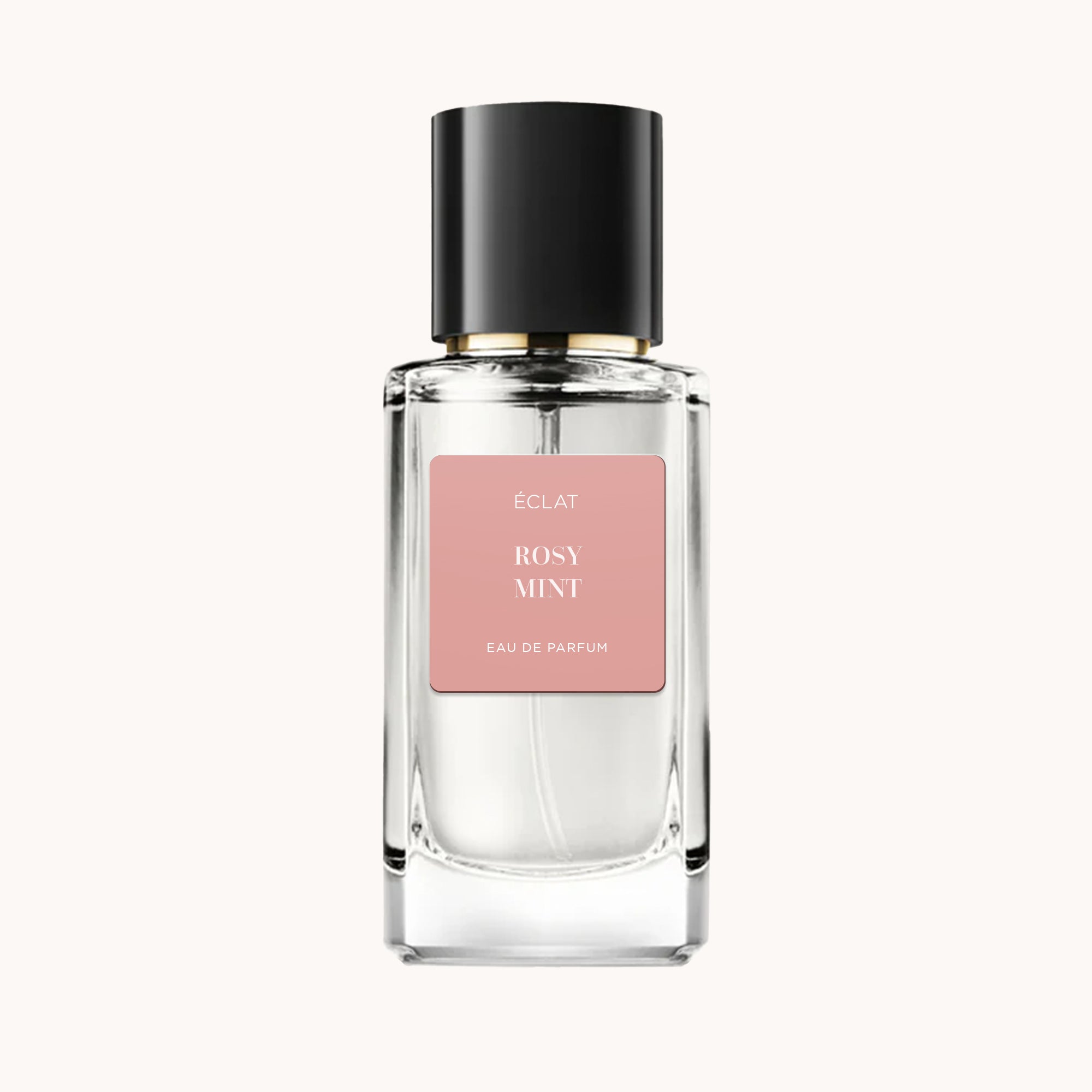 ÉCLAT Rosy Mint w przezroczystej szklanej butelce z czarną nakrętką i różową etykietą.