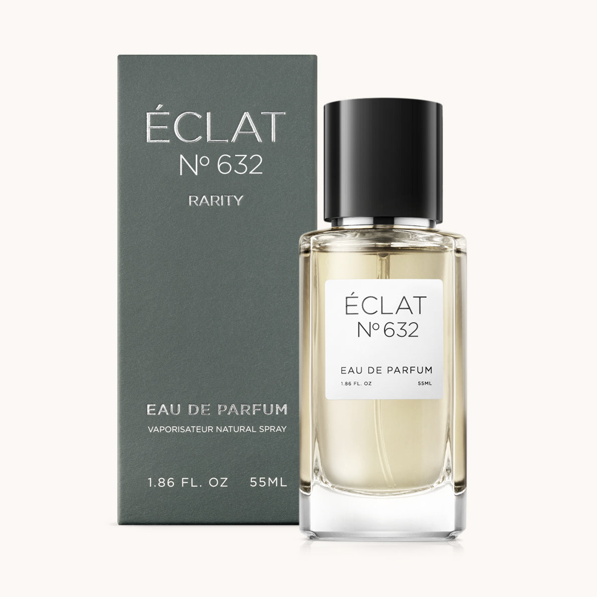 ÉCLAT Saffron, Oud & Praline w fasetowanej szklanej butelce z czarną nakrętką, obok ciemnego pudełka.