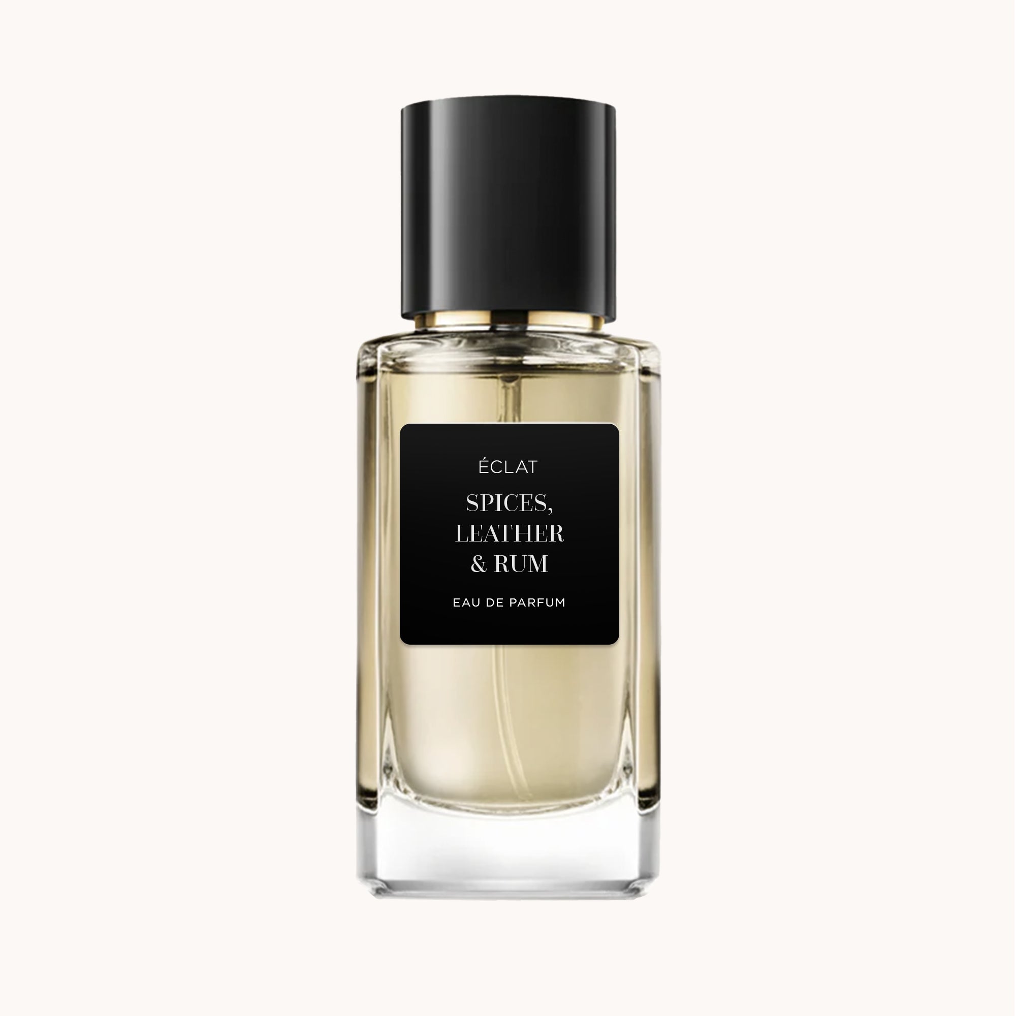Szklany flakon z czarną matową etykietą i ciemnym korkiem, prezentuje ÉCLAT Spices, Leather & Rum Eau de Parfum.