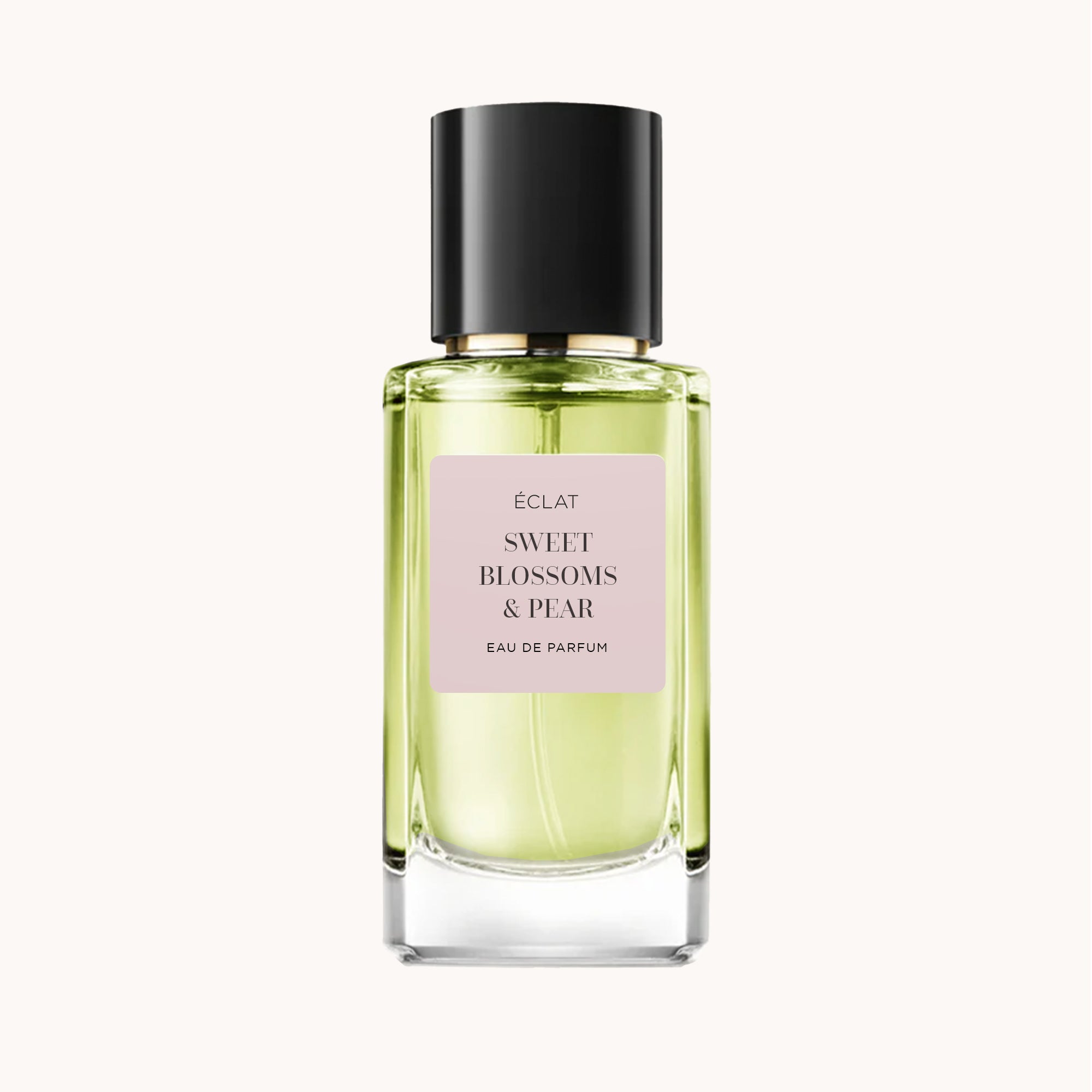 Fasadowa butelka szklana z jasnoróżową etykietą i czarną zakrętką dla ÉCLAT Sweet Blossoms & Pear.