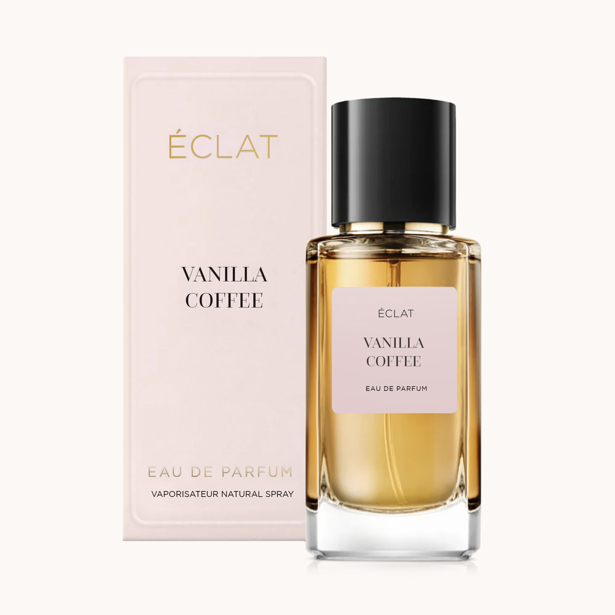 ÉCLAT Vanilla Coffee to przezroczysty szklany flakon z czarną nakrętką, obok eleganckiego różowego pudełka.